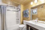 Main level bathroom with shower tub combo